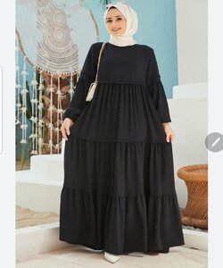 Layered abaya made of different types of fabric